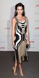 Camilla Belle se decantó por un Gucci escotado, lleno de brillos, flecos y formas asimétricas.